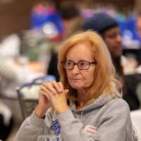person at luncheon table